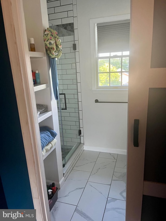 19 Zanella Dr, Emmitsburg, MD 21727 - bathroom with marble finish flooring, a stall shower, and baseboards