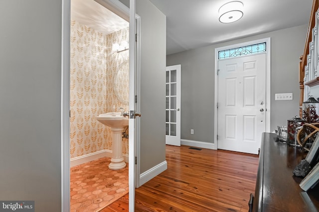 205 Mallard Dr, Stevensville, MD 21666 - foyer entrance featuring hardwood / wood-style flooring and baseboards