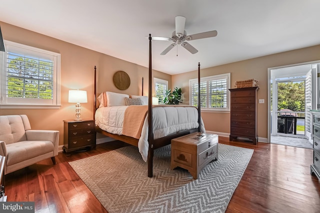 205 Mallard Dr, Stevensville, MD 21666 - bedroom featuring wood finished floors, baseboards, access to exterior, and a ceiling fan