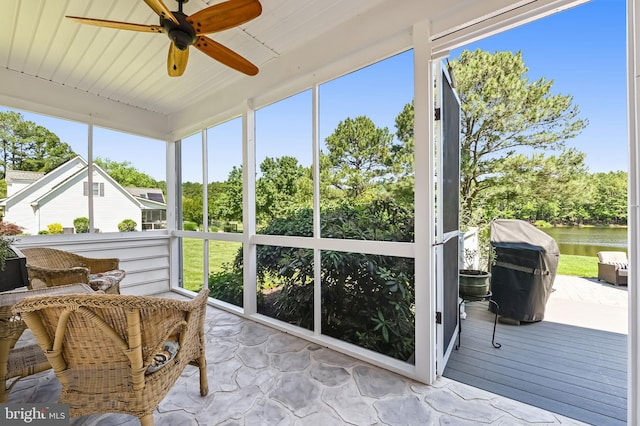 205 Mallard Dr, Stevensville, MD 21666 - sunroom / solarium featuring a ceiling fan and a water view