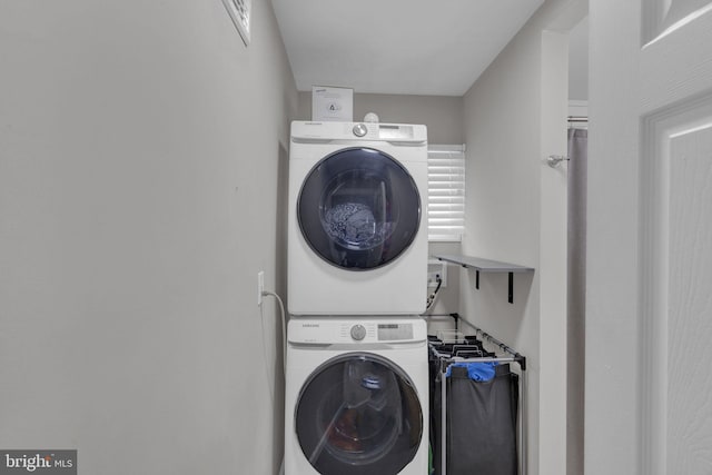 15 Wildflower Rd, Levittown, PA 19057 - washroom featuring stacked washing machine and dryer