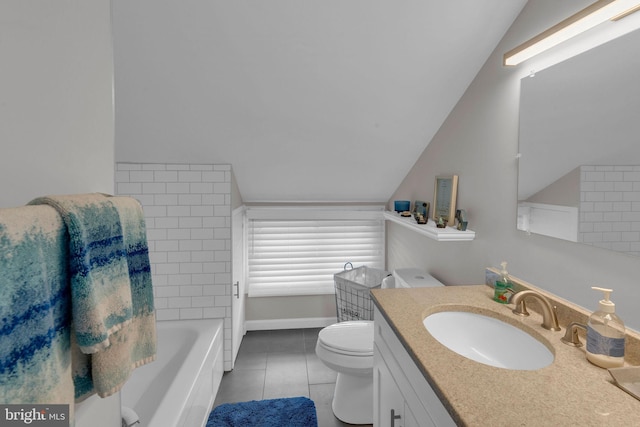 15 Wildflower Rd, Levittown, PA 19057 - bathroom featuring lofted ceiling, toilet, tile patterned floors, vanity, and a tub