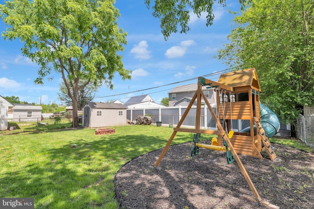 15 Wildflower Rd, Levittown, PA 19057 - view of yard featuring a playground and a fire pit