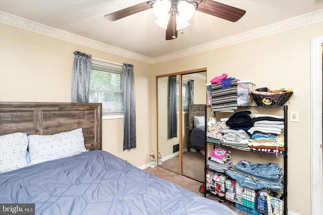 11 Langdon Rd, Burlington, NJ 08016 - bedroom featuring a closet, carpet flooring, ceiling fan, baseboards, and crown molding