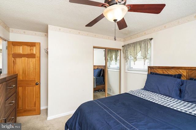 11 Langdon Rd, Burlington, NJ 08016 - bedroom featuring a textured ceiling, light carpet, a closet, and ceiling fan