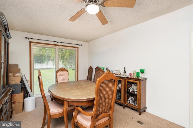 11 Langdon Rd, Burlington, NJ 08016 - dining space with light colored carpet, a textured ceiling, and ceiling fan