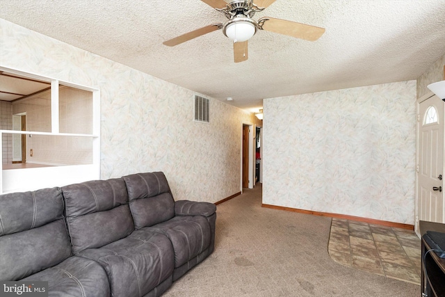 11 Langdon Rd, Burlington, NJ 08016 - living room featuring a ceiling fan, carpet flooring, a textured ceiling, wallpapered walls, and baseboards
