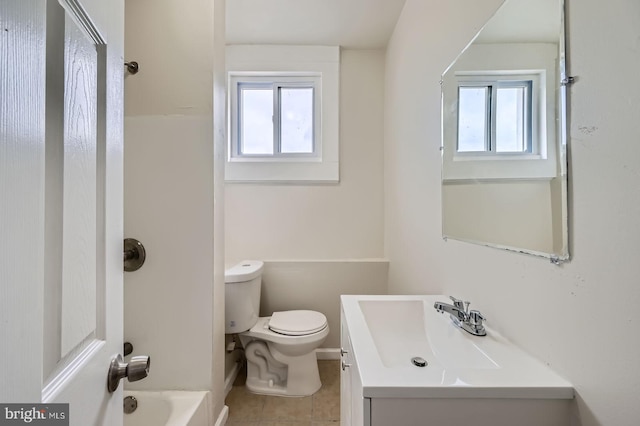 118 N Hilton St, Baltimore, MD 21229 - full bathroom with vanity, toilet, healthy amount of natural light, and tile patterned floors
