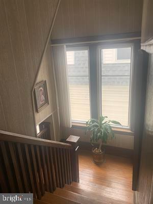 19 S Elberon Ave, Atlantic City, NJ 08401 - staircase featuring hardwood / wood-style floors and healthy amount of natural light