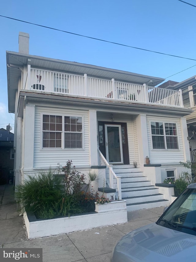 19 S Elberon Ave, Atlantic City, NJ 08401 - view of front of property featuring a balcony and a chimney
