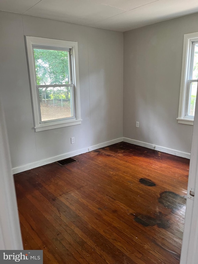 1208 First Ave, Seabrook, NJ 08302 - spare room with dark wood finished floors and baseboards