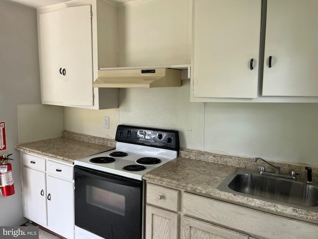 1208 First Ave, Seabrook, NJ 08302 - kitchen with range with electric cooktop, under cabinet range hood, a sink, light countertops, and white cabinetry