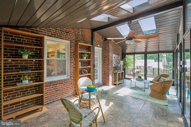 8404 Galveston Rd, Silver Spring, MD 20910 - sunroom featuring a skylight, vaulted ceiling, and a ceiling fan