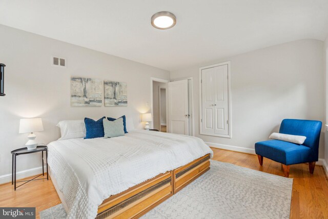 8404 Galveston Rd, Silver Spring, MD 20910 - bedroom with baseboards and light wood-style flooring