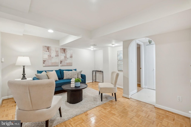 8404 Galveston Rd, Silver Spring, MD 20910 - living room featuring baseboards, arched walkways, and recessed lighting