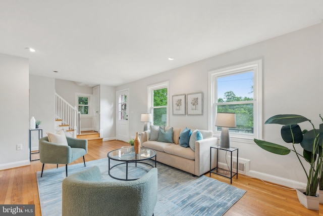 8404 Galveston Rd, Silver Spring, MD 20910 - living area featuring stairway, wood finished floors, baseboards, and recessed lighting