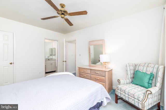 33340 Timberview Ct Unit 21003, Bethany Beach, DE 19930 - bedroom featuring connected bathroom, carpet floors, a sink, and ceiling fan