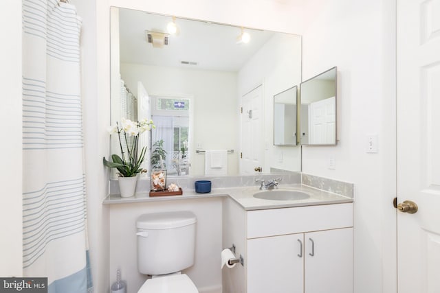 33340 Timberview Ct Unit 21003, Bethany Beach, DE 19930 - bathroom with vanity, toilet, and a shower with curtain