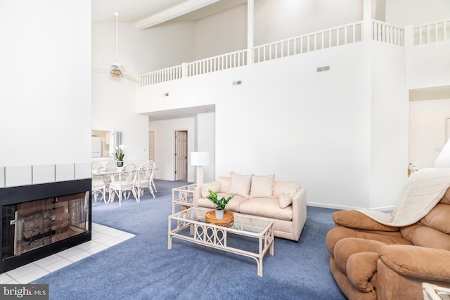 33340 Timberview Ct Unit 21003, Bethany Beach, DE 19930 - living room with high vaulted ceiling, carpet, ceiling fan, and beam ceiling