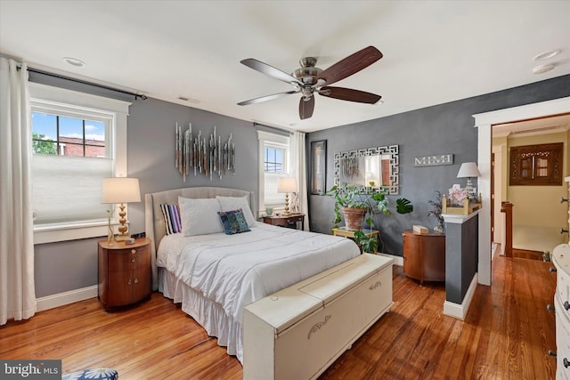 4224 Evans Chapel Rd, Baltimore, MD 21211 - bedroom with wood finished floors, baseboards, and a ceiling fan