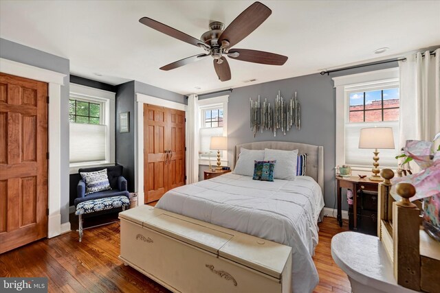 4224 Evans Chapel Rd, Baltimore, MD 21211 - bedroom featuring dark wood-type flooring, baseboards, a closet, and a ceiling fan