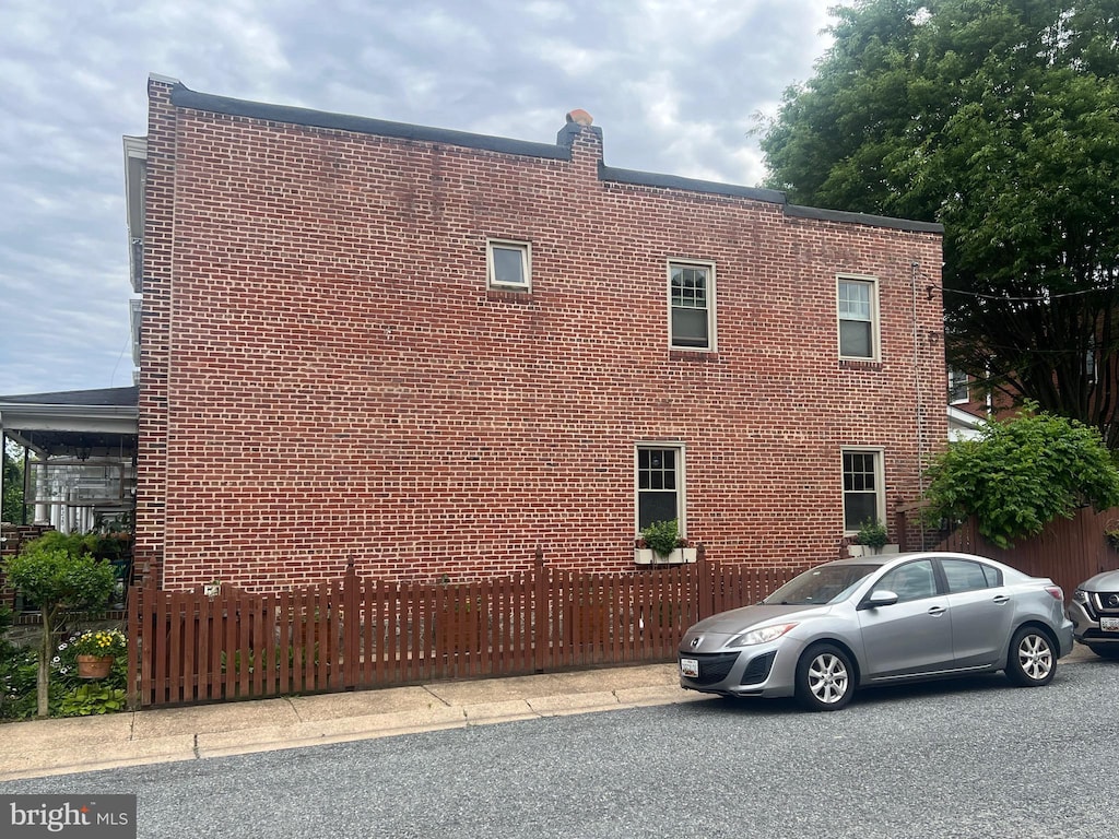 4224 Evans Chapel Rd, Baltimore, MD 21211 - view of side of home with brick siding