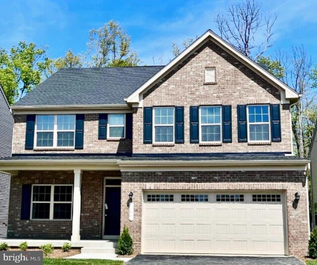 14623 Silver Hammer Way, Brandywine, MD 20613 - view of front facade with an attached garage, brick siding, and asphalt driveway