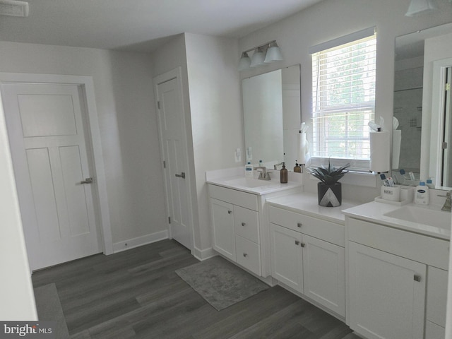14623 Silver Hammer Way, Brandywine, MD 20613 - full bath with vanity, wood finished floors, and baseboards