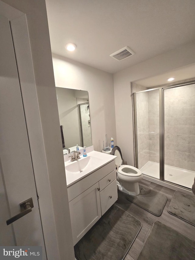 14623 Silver Hammer Way, Brandywine, MD 20613 - bathroom featuring vanity, a stall shower, toilet, and recessed lighting