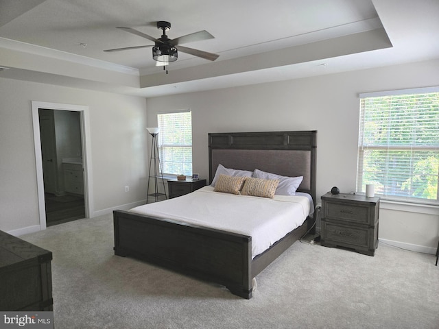 14623 Silver Hammer Way, Brandywine, MD 20613 - carpeted bedroom with a raised ceiling, baseboards, ensuite bathroom, and a ceiling fan