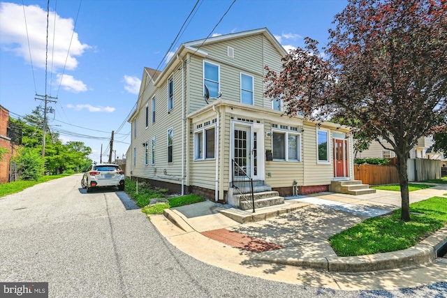 3603 6th St, Baltimore, MD 21225 - traditional-style house featuring entry steps