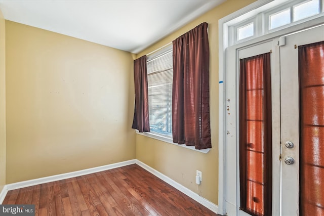 3603 6th St, Baltimore, MD 21225 - foyer with baseboards, hardwood / wood-style flooring, and plenty of natural light