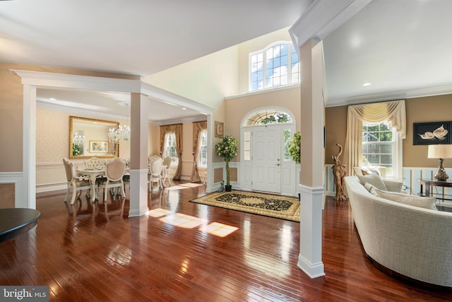 60 Sleepy Hollow Dr, Tabernacle, NJ 08088 - foyer entrance featuring wainscoting, wood-type flooring, a chandelier, and ornamental molding