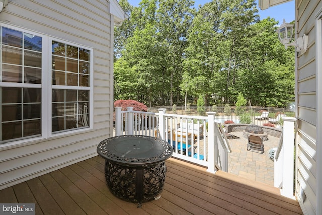 60 Sleepy Hollow Dr, Tabernacle, NJ 08088 - wooden terrace featuring an outdoor fire pit, a fenced backyard, and a patio area