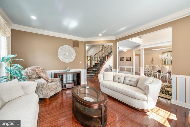 60 Sleepy Hollow Dr, Tabernacle, NJ 08088 - living area featuring stairway, ornamental molding, a wainscoted wall, hardwood / wood-style floors, and a chandelier