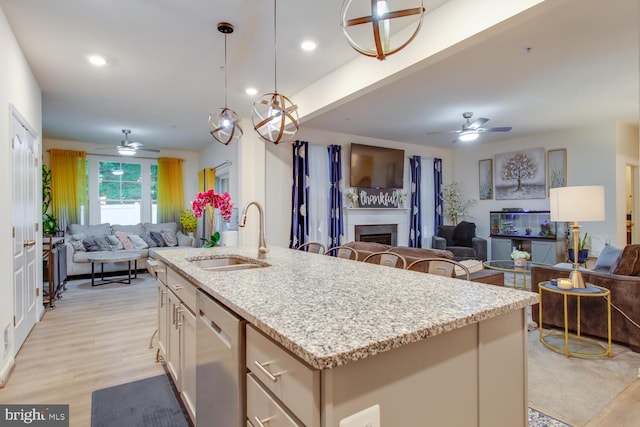 16600 Tortola Dr, Accokeek, MD 20607 - kitchen featuring open floor plan, a sink, dishwasher, a ceiling fan, and recessed lighting