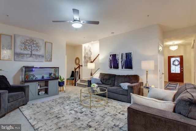 16600 Tortola Dr, Accokeek, MD 20607 - living room with stairs, carpet, and ceiling fan