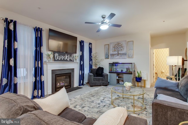 16600 Tortola Dr, Accokeek, MD 20607 - carpeted living room featuring a fireplace with flush hearth, ceiling fan, and baseboards