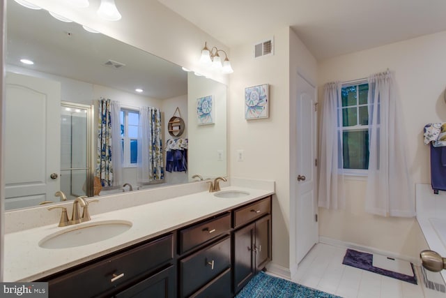 16600 Tortola Dr, Accokeek, MD 20607 - bathroom featuring double vanity, tile patterned floors, a shower with shower curtain, and recessed lighting