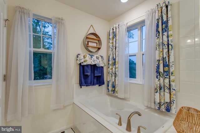 16600 Tortola Dr, Accokeek, MD 20607 - full bath featuring a bath and baseboards