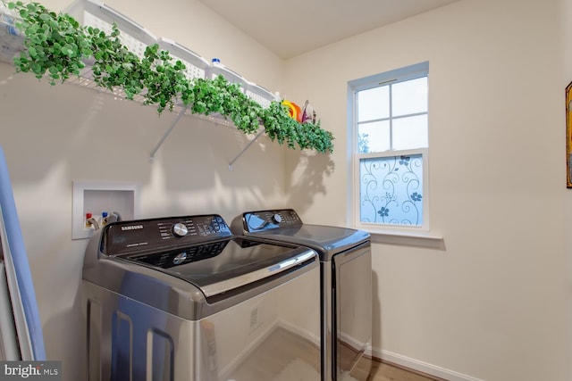 16600 Tortola Dr, Accokeek, MD 20607 - laundry room with independent washer and dryer and baseboards