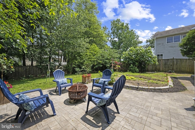 3403 Niagara Rd, Annapolis, MD 21403 - fenced backyard featuring an outdoor fire pit and a patio area