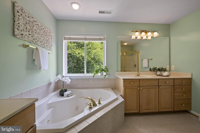 3403 Niagara Rd, Annapolis, MD 21403 - full bathroom featuring vanity, a shower stall, a whirlpool tub, and tile patterned floors