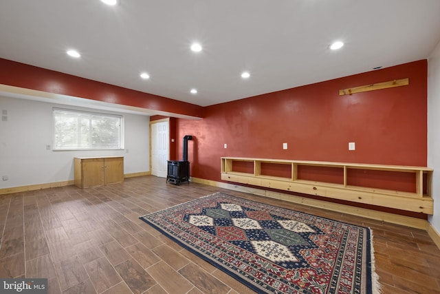 3403 Niagara Rd, Annapolis, MD 21403 - below grade area featuring a wood stove, recessed lighting, and wood finished floors