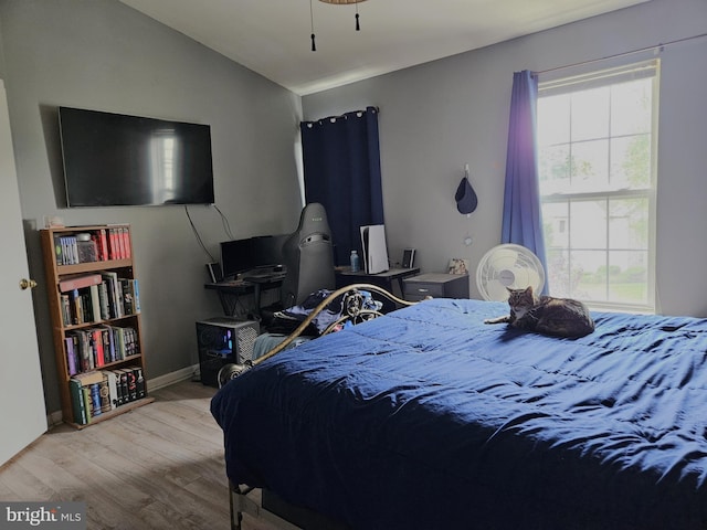 1106 Crestmont Dr, Mantua, NJ 08051 - bedroom with multiple windows, wood finished floors, and vaulted ceiling