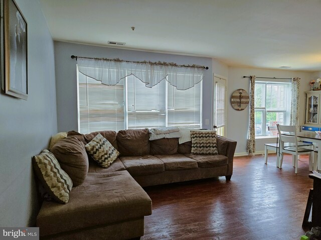 1106 Crestmont Dr, Mantua, NJ 08051 - living room with dark wood-style floors and baseboards