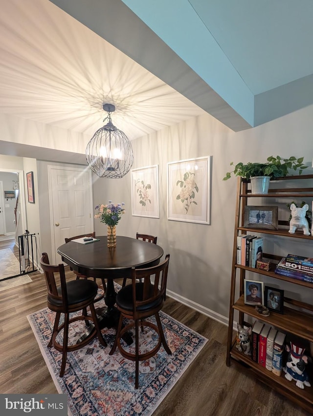 513 Dakemich Ct, Enola, PA 17025 - dining area featuring wood finished floors, baseboards, and a chandelier