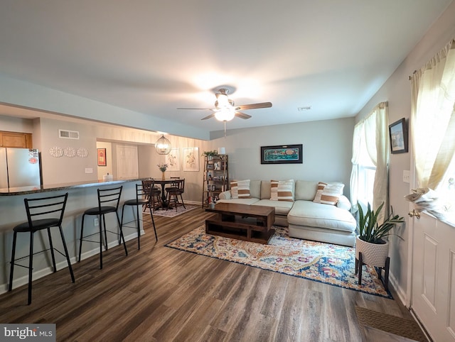 513 Dakemich Ct, Enola, PA 17025 - living area featuring dark wood-type flooring, ceiling fan, and baseboards