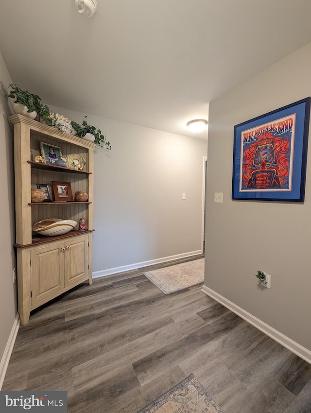 513 Dakemich Ct, Enola, PA 17025 - unfurnished dining area with dark wood-type flooring and baseboards