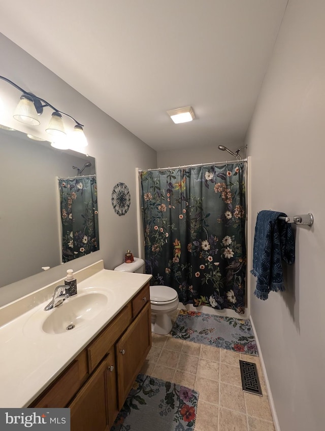 513 Dakemich Ct, Enola, PA 17025 - bathroom featuring vanity, toilet, and a shower with shower curtain